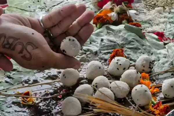 devotee performing pind daan in ayodhya, poojan services for nris