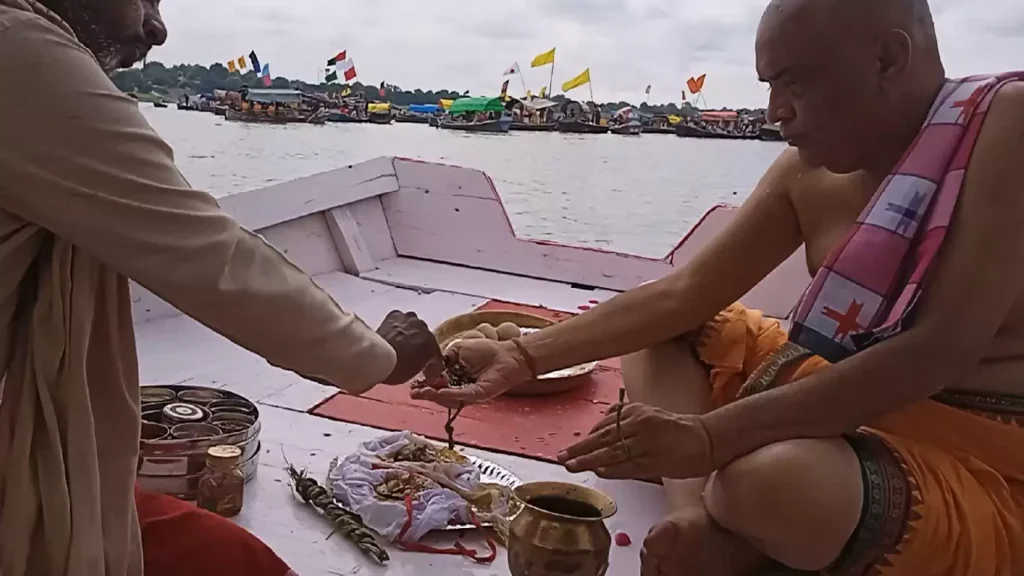 devotee performing asthi visarjan pooja-What is asthi visarjan?