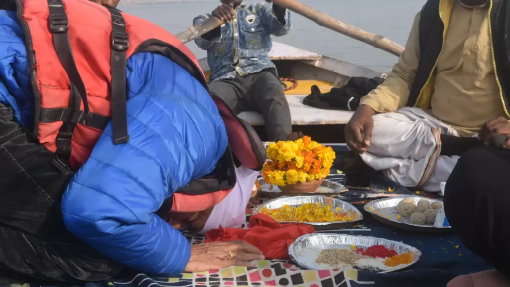 A devotee taking blessings from his ancestors during shradh