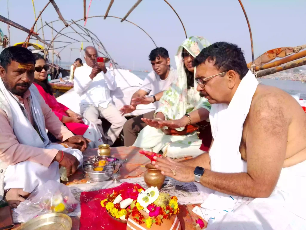 What specific etiquette or precautions should be observed during the boat ride and the ritual at the Sangam?