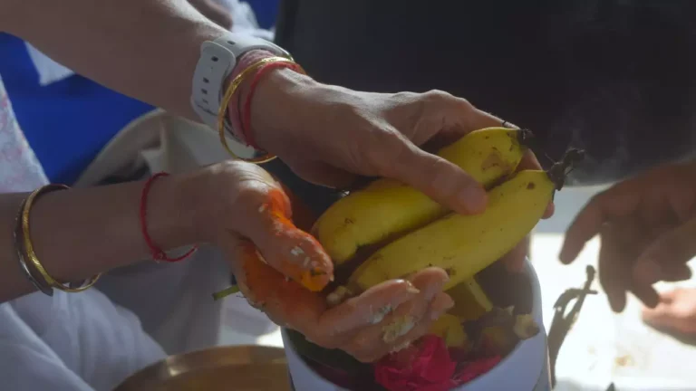 Photo of a lady performing Asthi Pooja