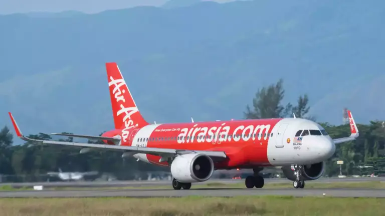Photo of a Air Asia flight on the runway