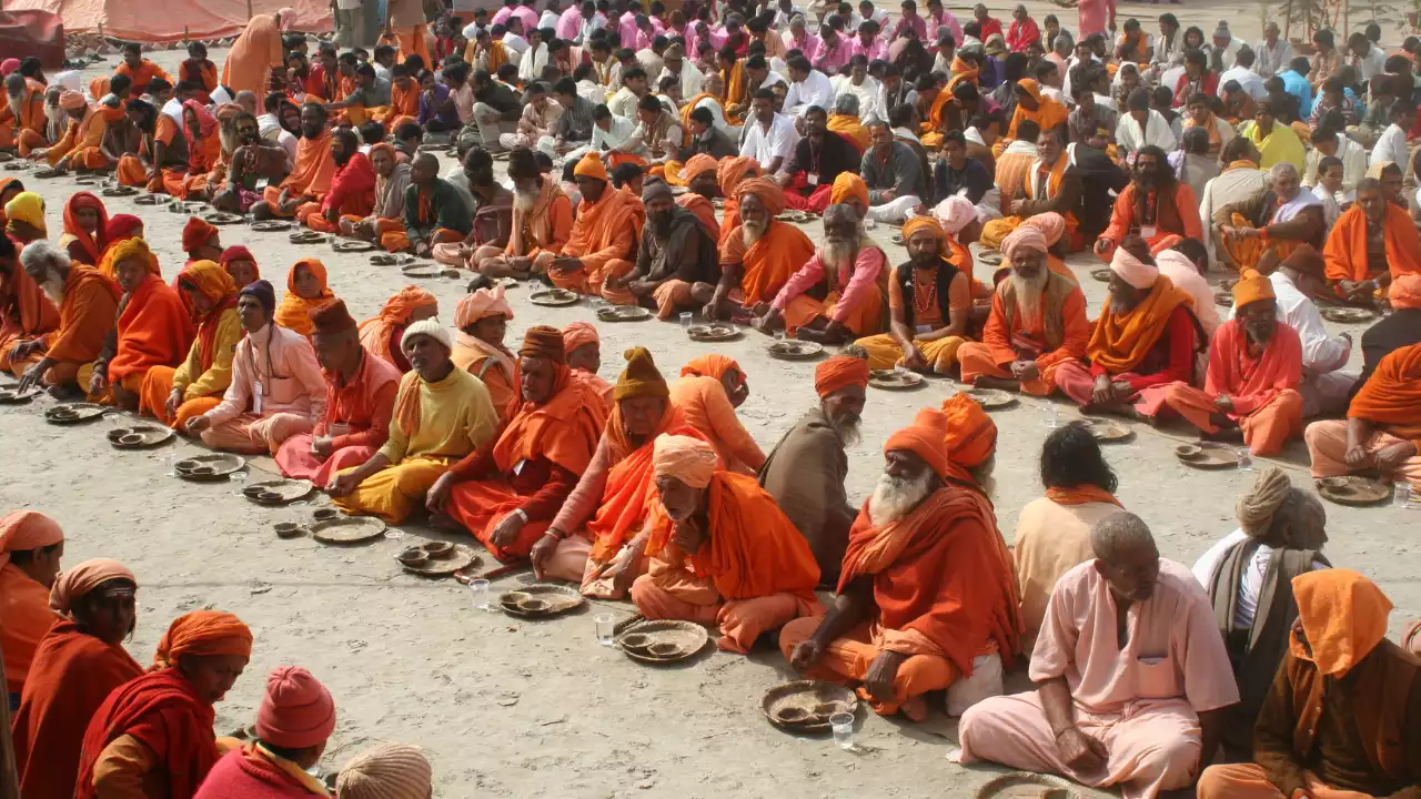 Donate food to needly people- Book Pooja and Daan Services Online at Magh Mela